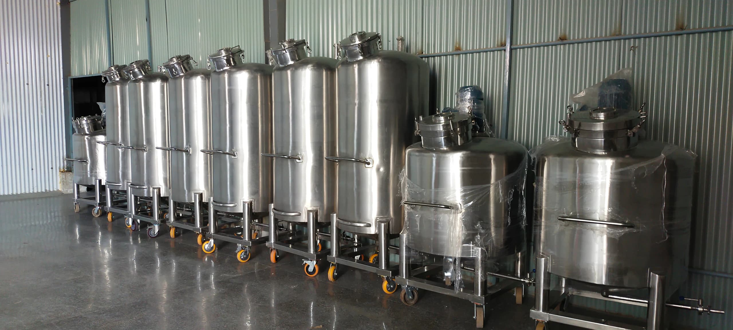 Stainless steel tank with fittings