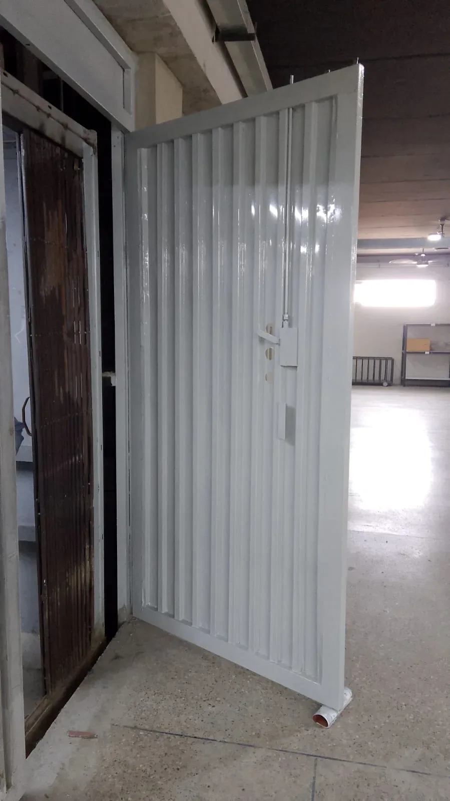 Painted cargo lift landing door